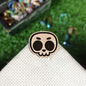 TINY SKULL WOOD PIN